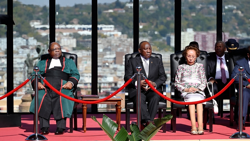Cyril Ramaphosa (centre) will head what he calls a government of national unity with five other parties