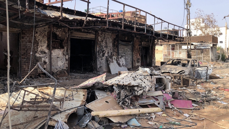War has raged for more than a year in Sudan - this picture taken on 30 May shows damaged shops in Omdurman