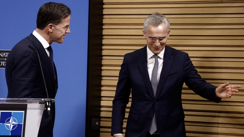 NATO is grappling with major challenges as Jens Stoltenberg (R) makes way for Mark Rutte (L)