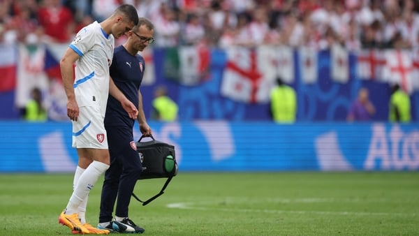 Patrik Schick leaves the pitch after being substituted following an injury