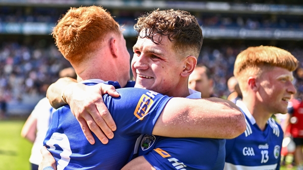 Laois players Kevin Swayne and James Kelly, left, celebrate after their side's victory