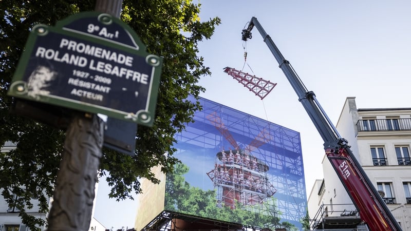 The temporary sails are winched into position