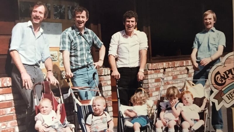Armagh players, from left, Colum McKinstry, Jimmy Smyth, Denis Stevenson and Paddy Moriarty with their children at Disneyland during the 1982 American tour. Picture: Jimmy Smyth