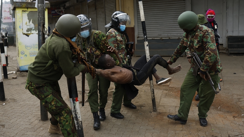 Dozens of protesters gathered in Nairobi's central business district and soldiers were deployed