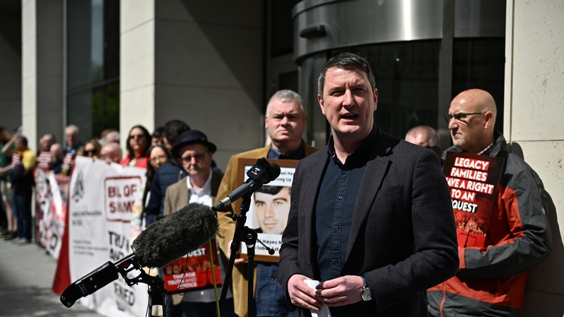 The main challenger to John Finucane is DUP candidate Phillip Brett