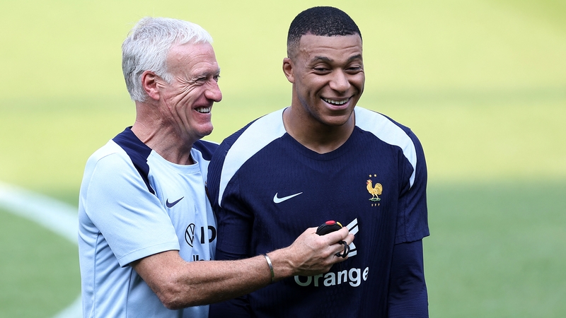 Kylian Mbappe (R) with France boss Didier Deschamps in training