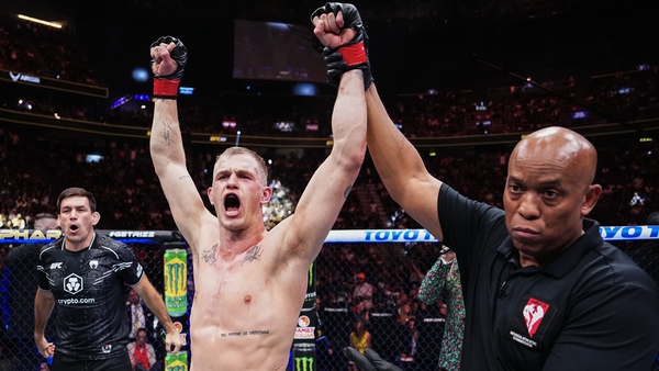 Ian Machado Garry reacts after his victory over Michael Page was confirmed