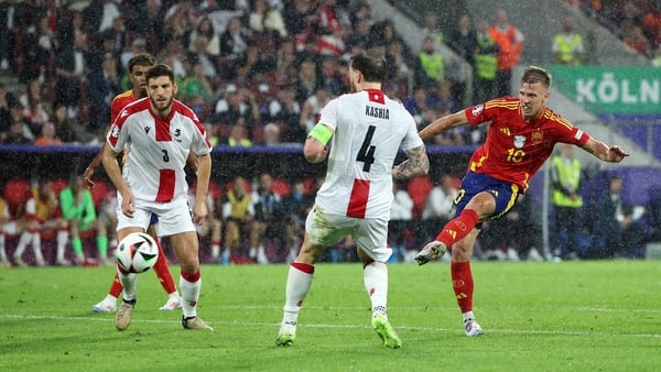 Dani Olmo of Spain scores his team's fourth goal