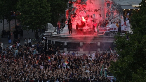 Opponents of the far-right protest at Place de la Republique in Paris after the first round of the election