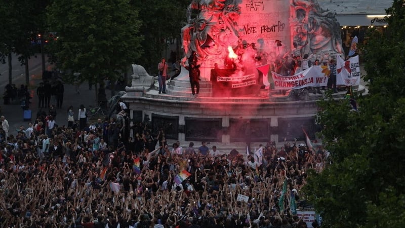 Opponents of the far-right protest at Place de la Republique in Paris after the first round of the election