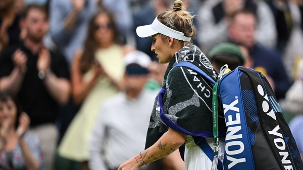 Marketa Vondrousova leaves the court after her surprise loss