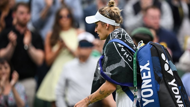 Marketa Vondrousova leaves the court after her surprise loss