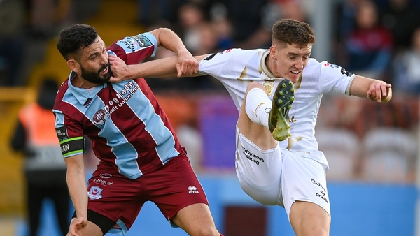 John Martin of Shelbourne in action against Drogheda's Dave Webster