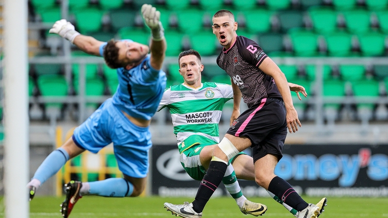 Johnny Kenny lifts home the winner for Shamrock Rovers