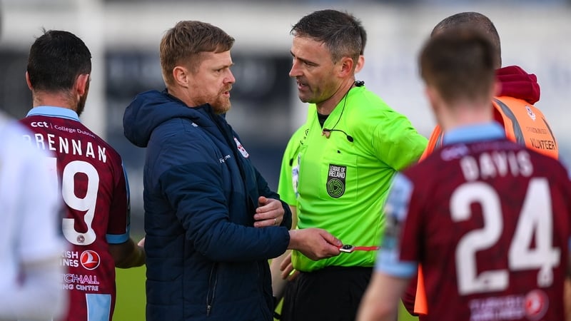 Damien Duff with referee Paul McLaughlin after the final whistle