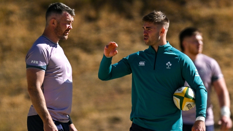 Peter O'Mahony (l) speaks to Jack Crowley (r) at Friday's training session at St Peter's College in Johannesburg