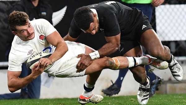 George Furbank is tackled by New Zealand's Sevu Reece