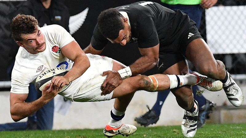 George Furbank is tackled by New Zealand's Sevu Reece