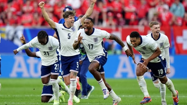England players celebrate Trent Alexander-Arnold's decisive penalty