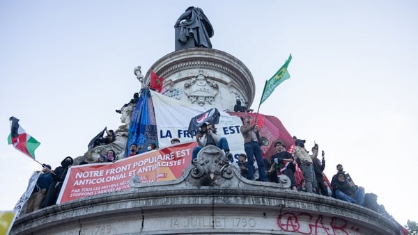 Supporters of the victorious left wing New Popular Front gather at the Place de la Republique in Paris