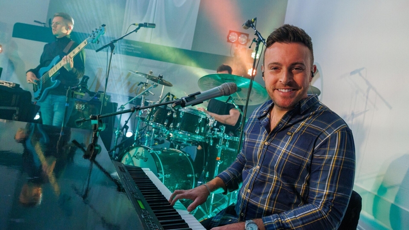 Nathan Carter warming up with his band before their performance in Castlerea Prison