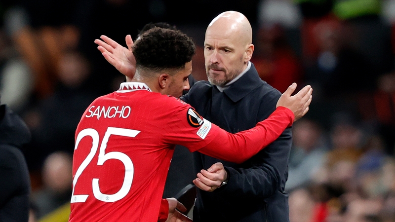 Jadon Sancho (L) with Erik ten Hag