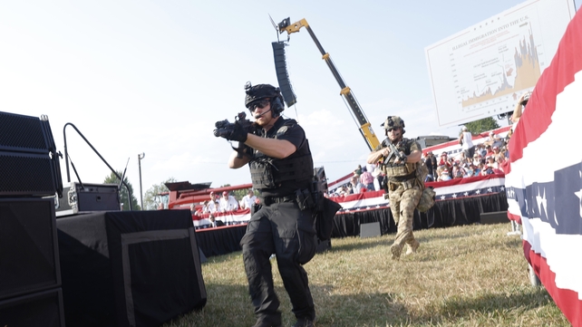 Law enforcement officers on the move after the shooting