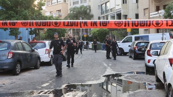 Tel Aviv police said a search revealed one man 'dead in his apartment,' bearing injuries caused by shrapnel