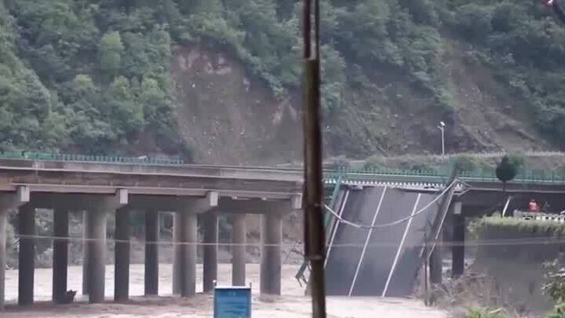 The bridge over a river in Shaanxi buckled at around 8.40pm last night