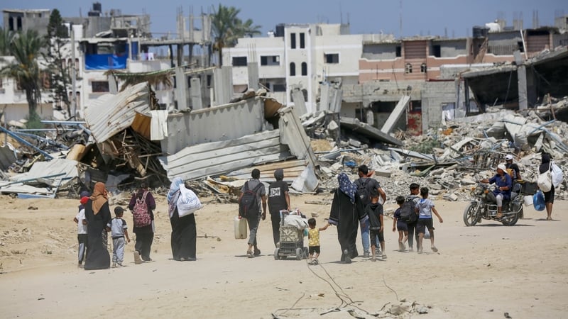 Some families fled carrying mattresses and other belongings