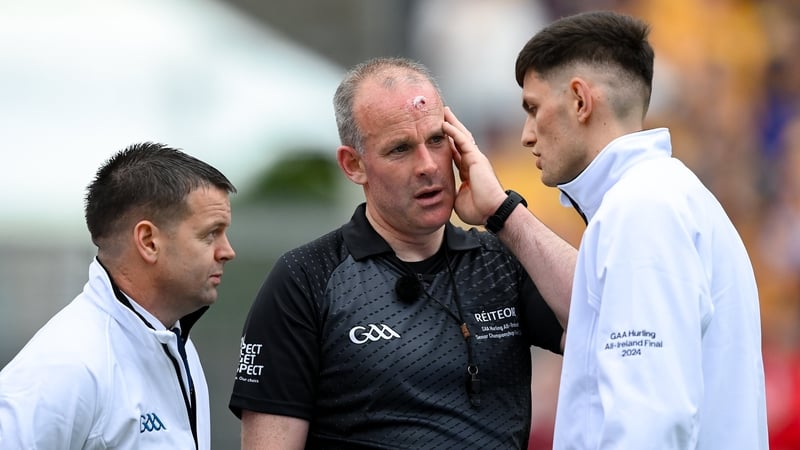 Referee Johnny Murphy consults with his umpires during Sunday's All-Ireland final