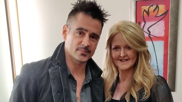 Colin Farrell and Emma Fogarty, who said she is 'proud and grateful' to be joined by the actor for the last 4km of the marathon