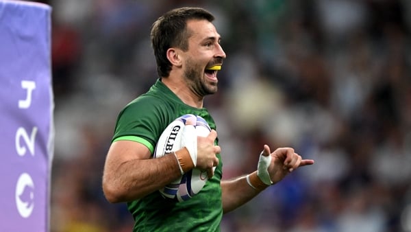 Harry McNulty celebrates his try against Japan