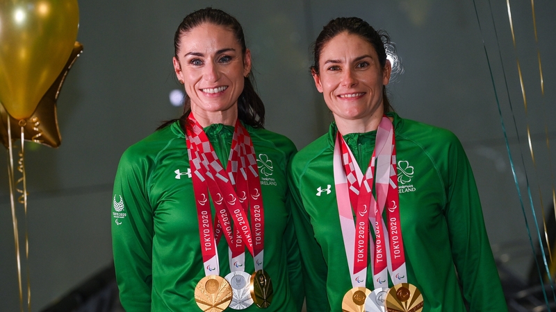 Eve McCrystal, left, and Katie George Dunlevy with their Tokyo 2020 Paralympic Games medal haul