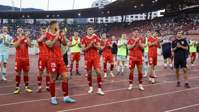 Shelbourne players and staff acknowledge the travelling support at the Stadion Letzigrund in Switzerland