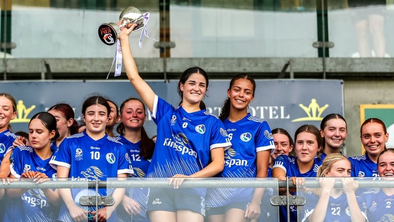 Cavan captain Ellie Brady lifts the cup