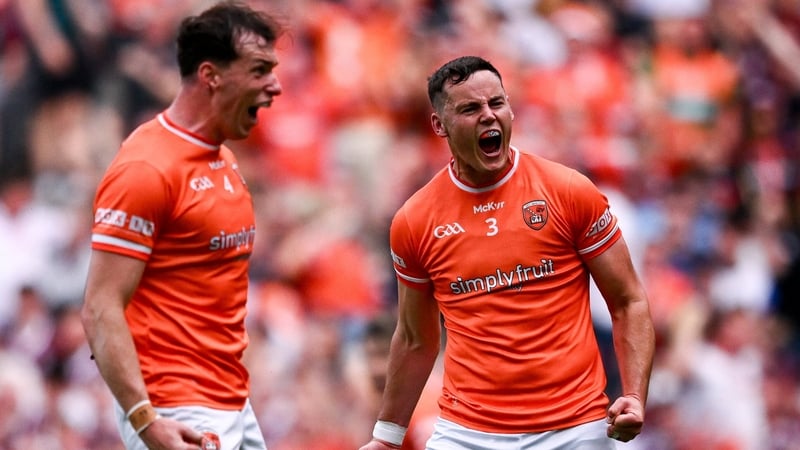 Aaron McKay of Armagh (R) celebrates with Barry McCambridge