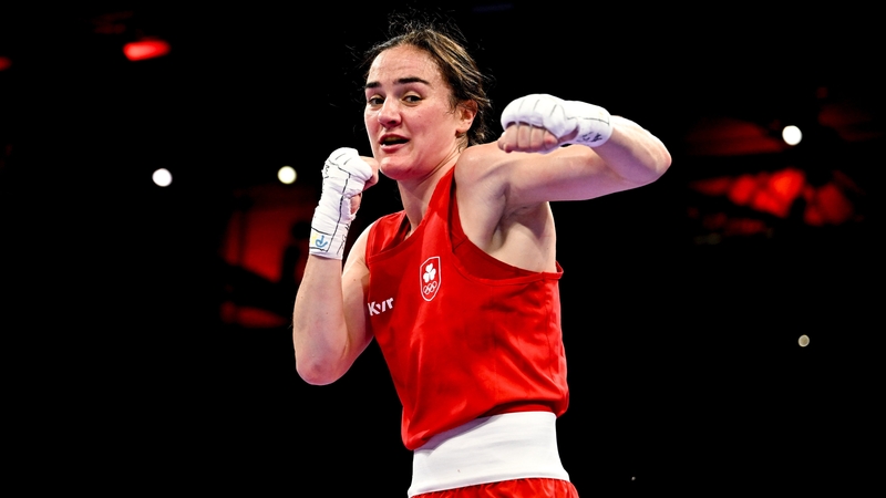 Kellie Harrington poses for the cameras following her victory in Paris