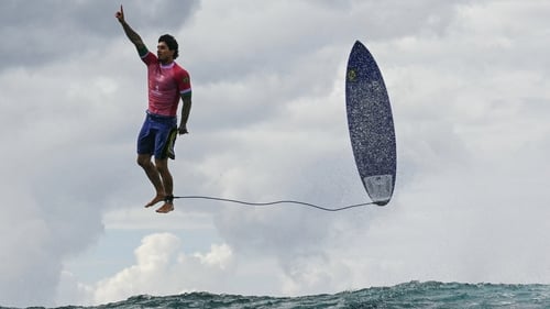 Brazil's Gabriel Medina reacts after getting a large wave in men's surfing competition during the Paris 2024 Olympic Games in Tahiti. Photo: Jerome Brouilet/AFP