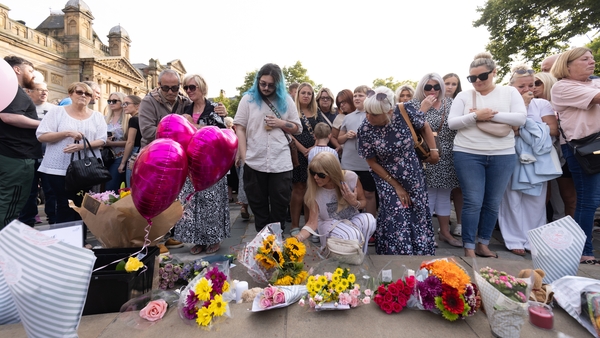 Members of the public gathered outside Southport's Atkinson arts venue to pay their respects