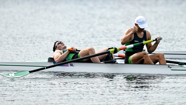 Ross Corrigan (l) and Nathan Timoney after they crossed the line in the semi-final