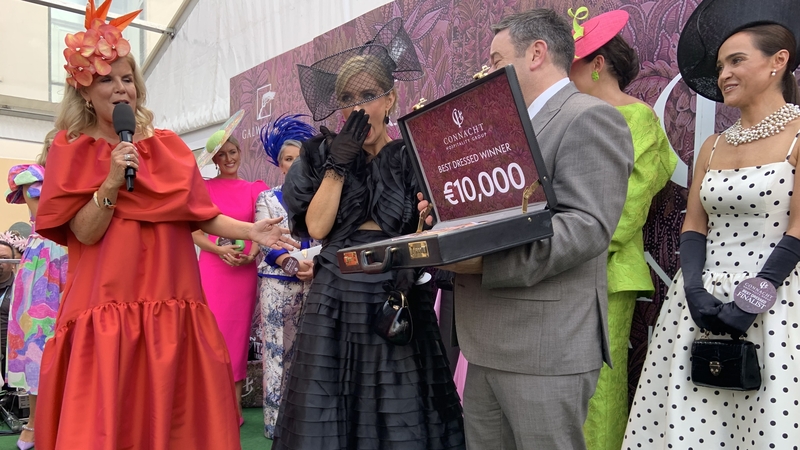 Davina Knight receiving her prize after being crowned Best Dressed Lady at the Galway Races