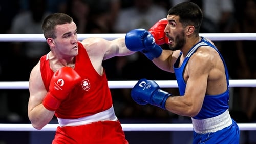 Jack Marley (left) lands a punch on his opponent