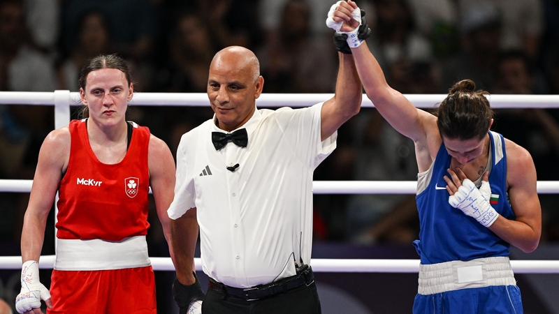 Svetlana Staneva has her arm raised in victory following her win over Michaela Walsh