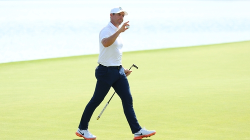 Rory McIlroy acknowledges fans after completing his round