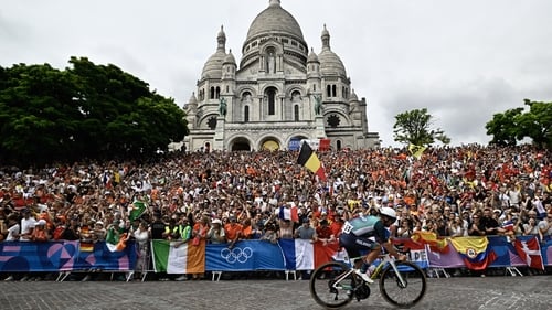 Ireland's Ben Healy cycles past the Sacré-Coeur Basilica during the men's cycling road race at the Paris Olympic Games in 2024. Photo: Julie de Rosa AFP/Getty Images
