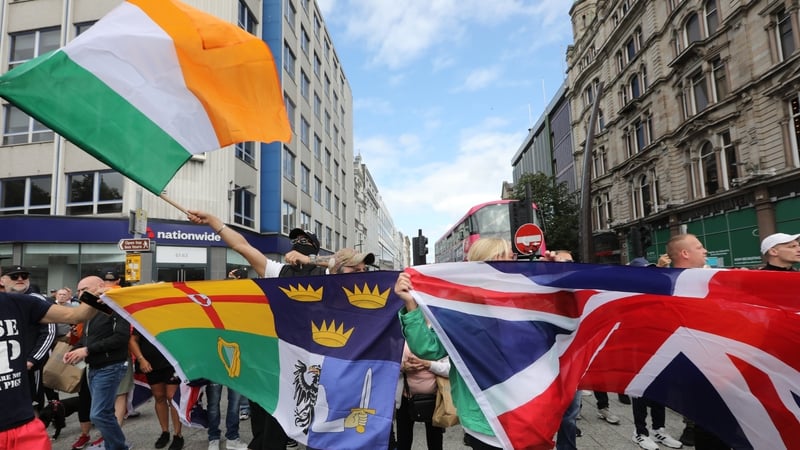 Protesters waving both the union flag and the tricolour took part in the protest