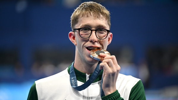 Wiffen celebrates with his bronze medal