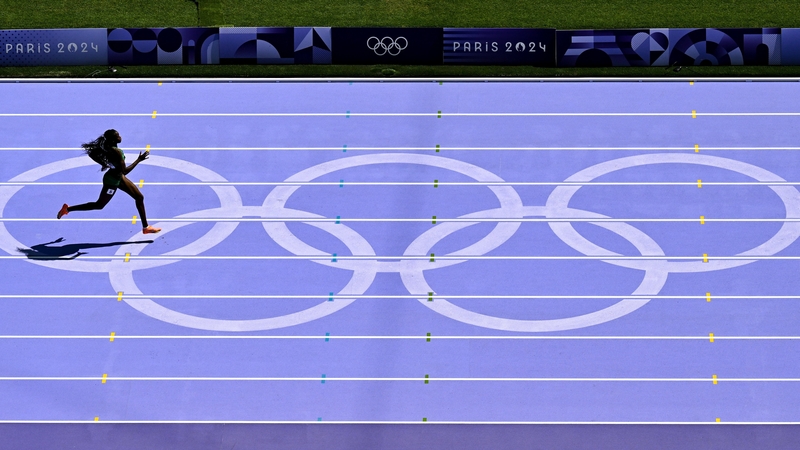 Rhasidat Adeleke streaking clear to win her 400m semi-final heat