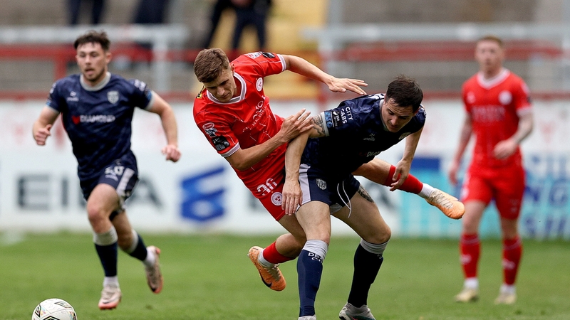 Will Jarvis and Ciarán Coll tangle at Tolka